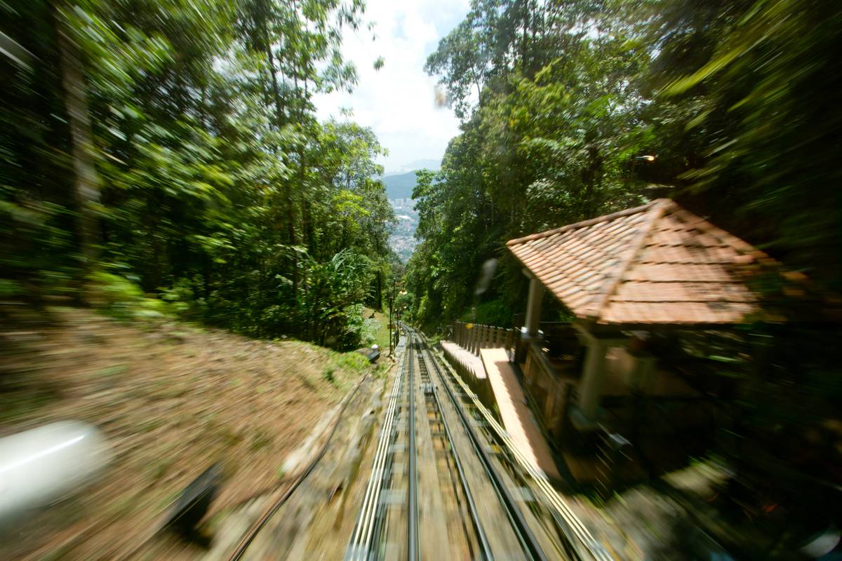 Going down on a funicular that ferries tourists up Penang Hill, 833 meters above sea level.