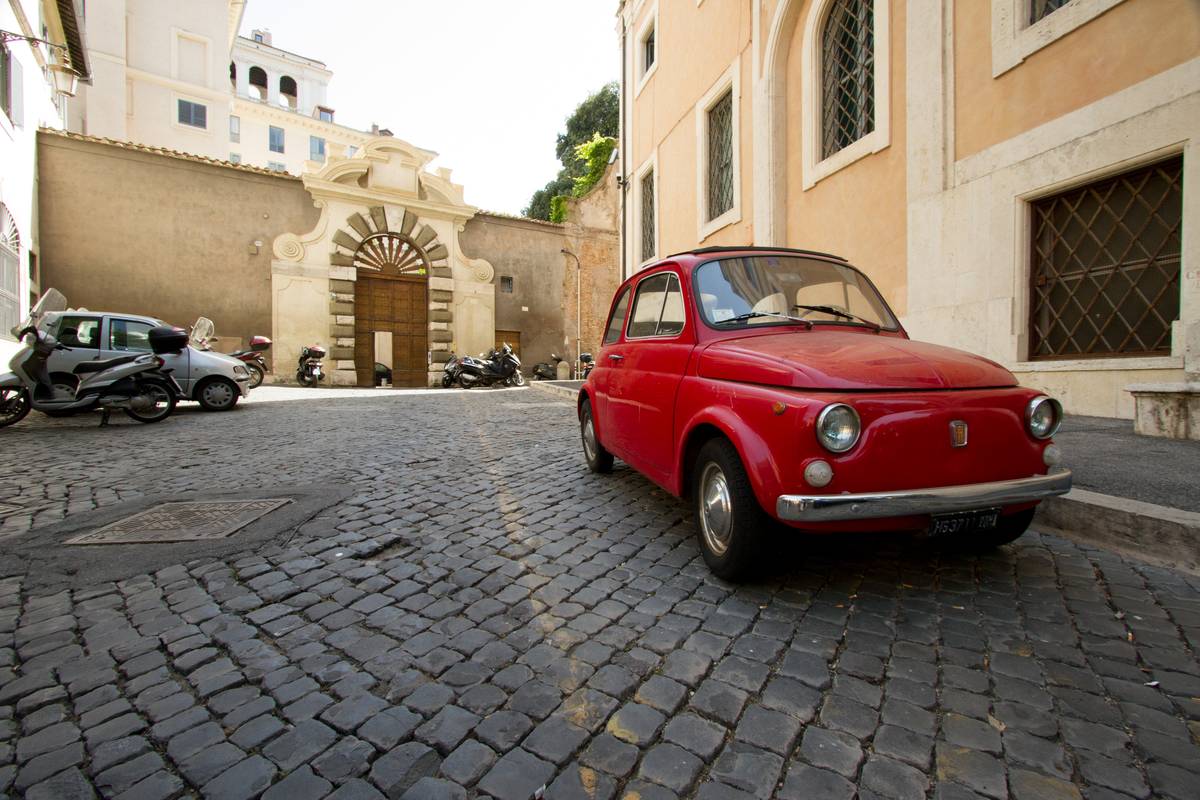 The venerable classic Fiat 500 and its younger brother are one of the more prevalent cars to swarm Roman streets today