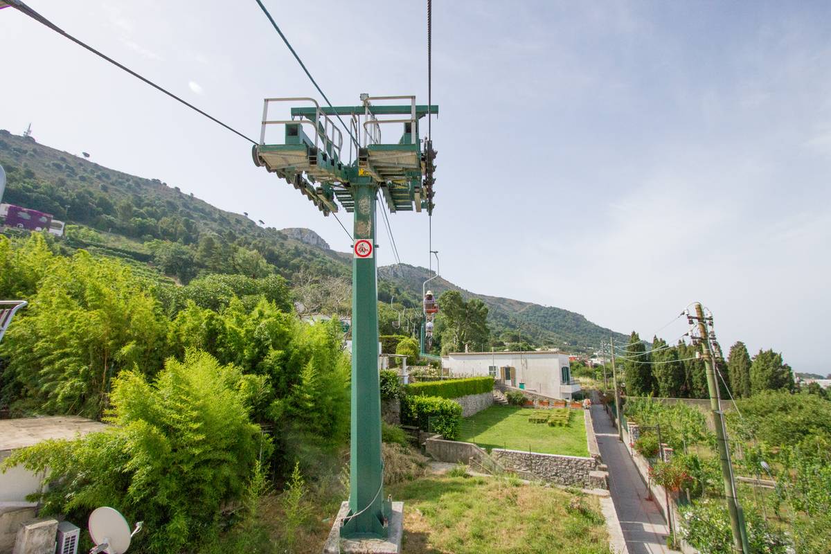 A chair lift takes tourists up to the top of Monte Solarno, the highest point of Capri. Most of the island is in view at this vantage point