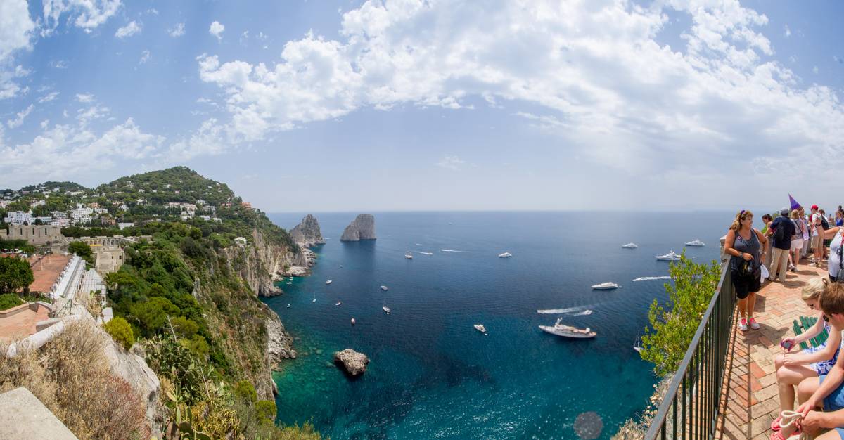 View of the Tyrrhenian Sea on the southern side of the island. The Faraglioni, Capri’s signature view, can be seen in the far center