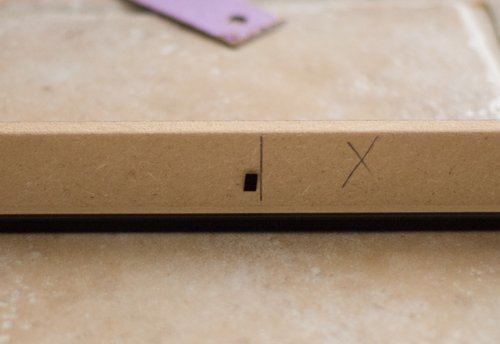 Frame anchor positioned at the cut off line