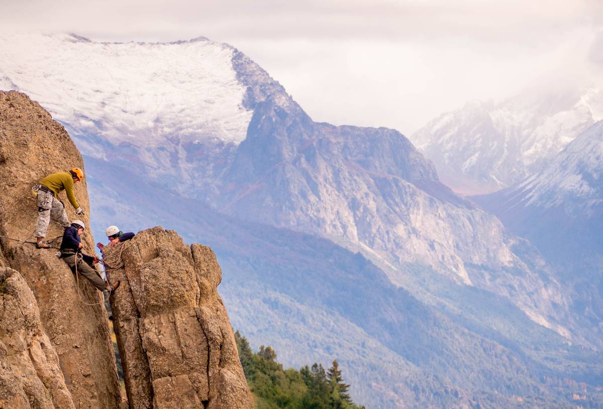 Military personnel training on the mountains.