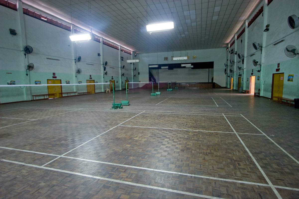 Badminton courts fill up the space within.