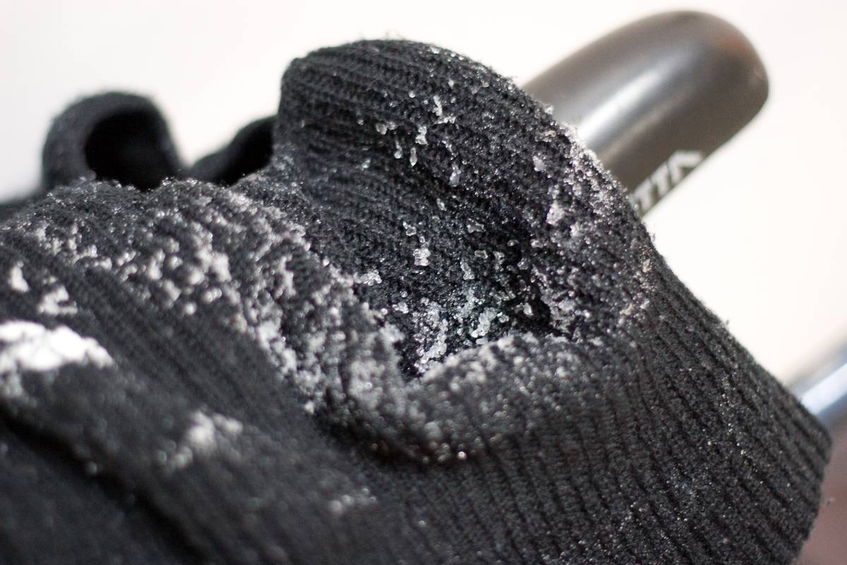 Ice forming on the balaclava, formed from the condensation of breath
