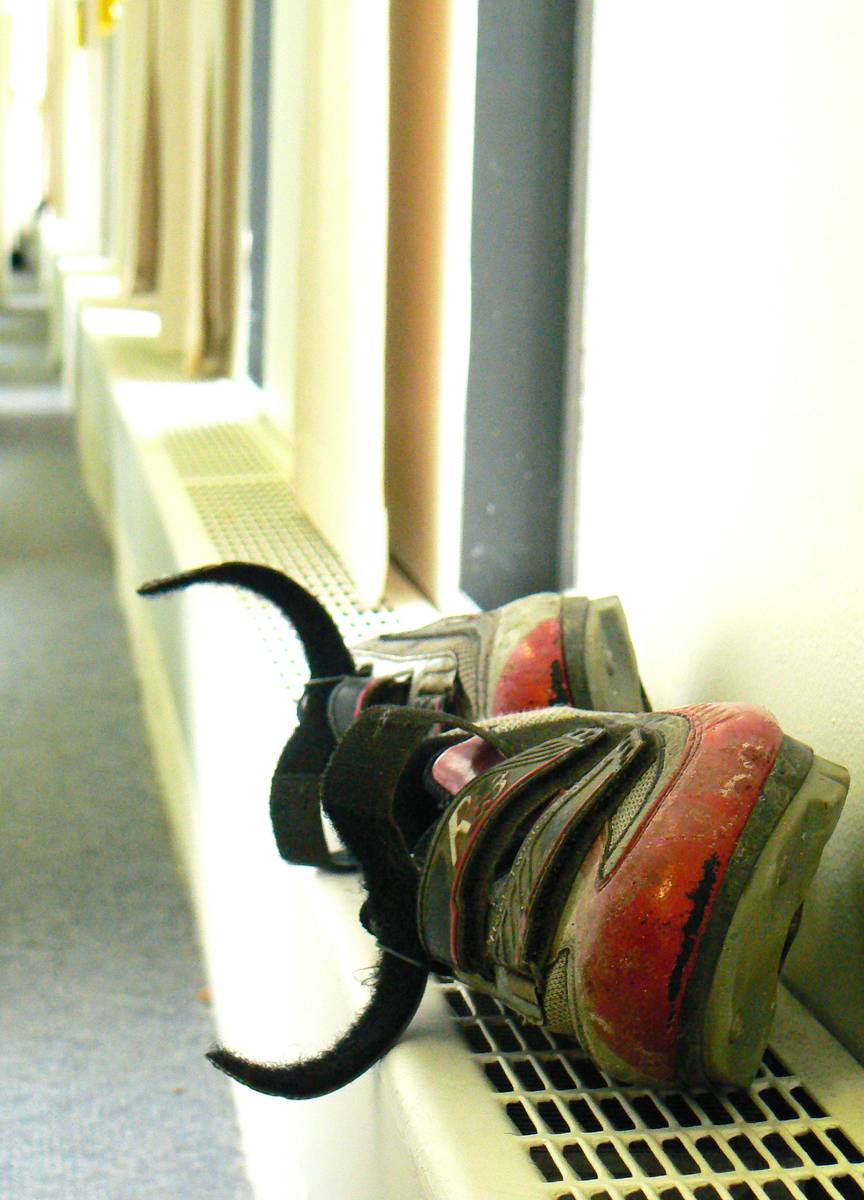 Drying my shoes on a heating vent at the University of Guelph library