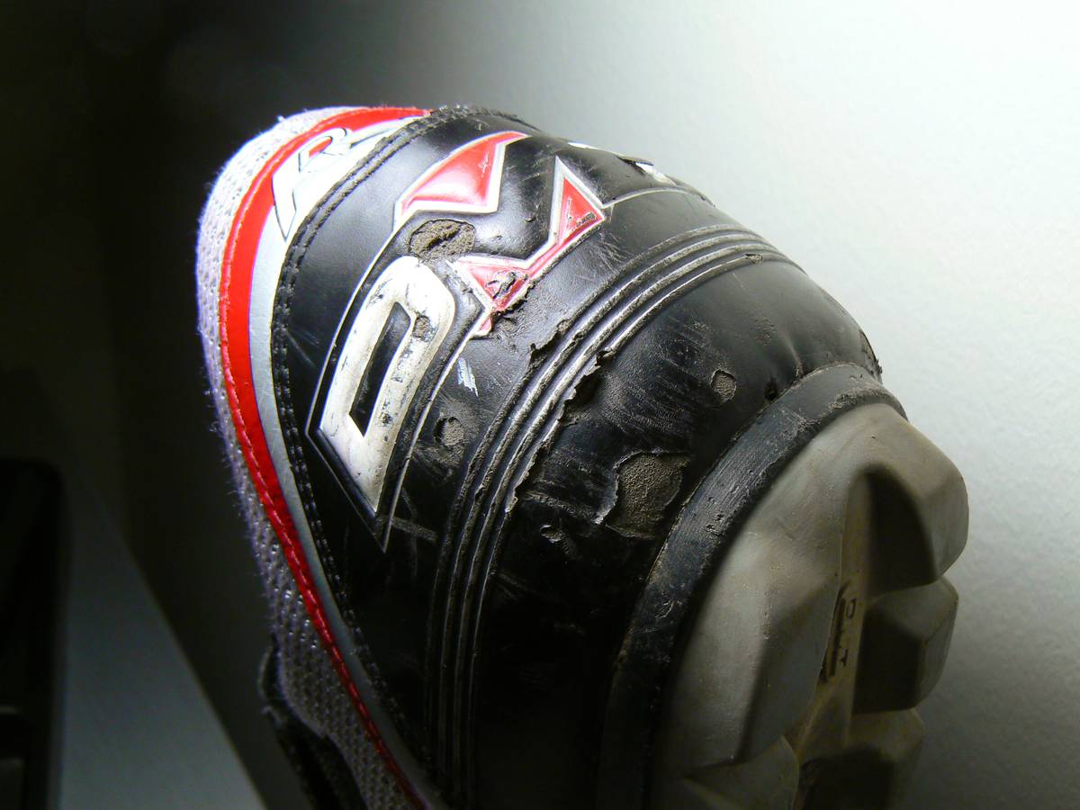 A lot of damage behind the shoe after nearly a year of use, mostly from a car accident. Mostly skin deep damage, though