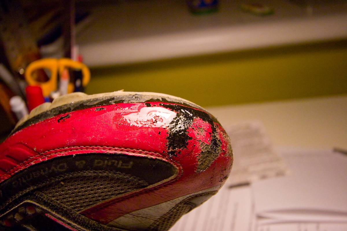 Epoxy applied to the front of the shoe, covering the gashes