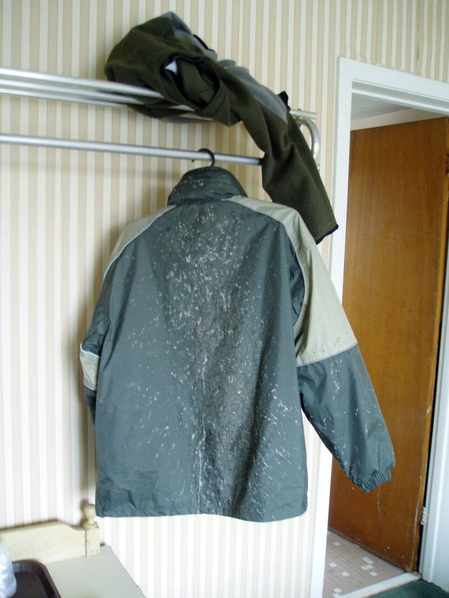 A streak of dirt on the back of my jacket from road spray
