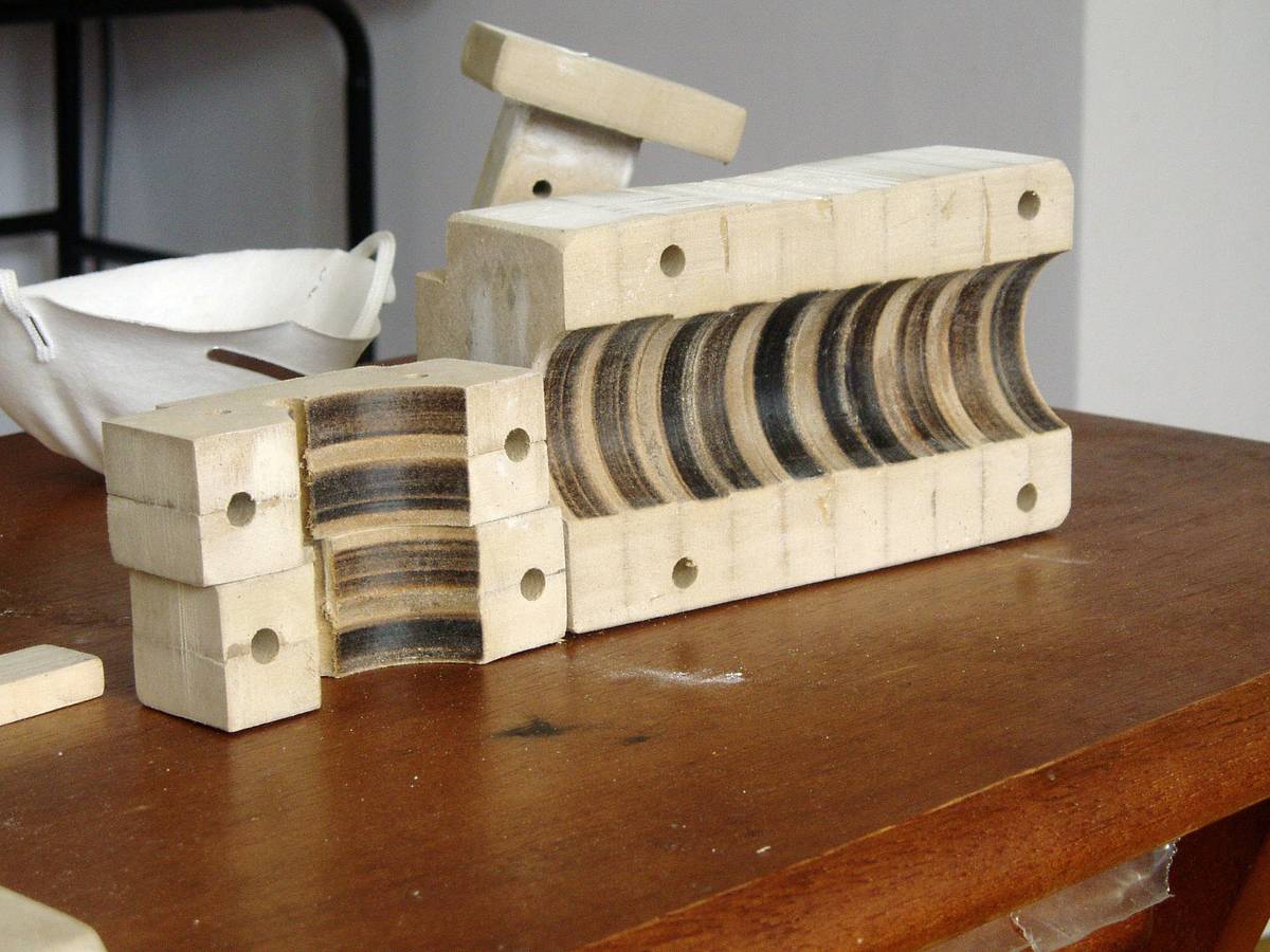 To achieve the thickness required for a stable mount, the board was shaped and screwed together in a stack