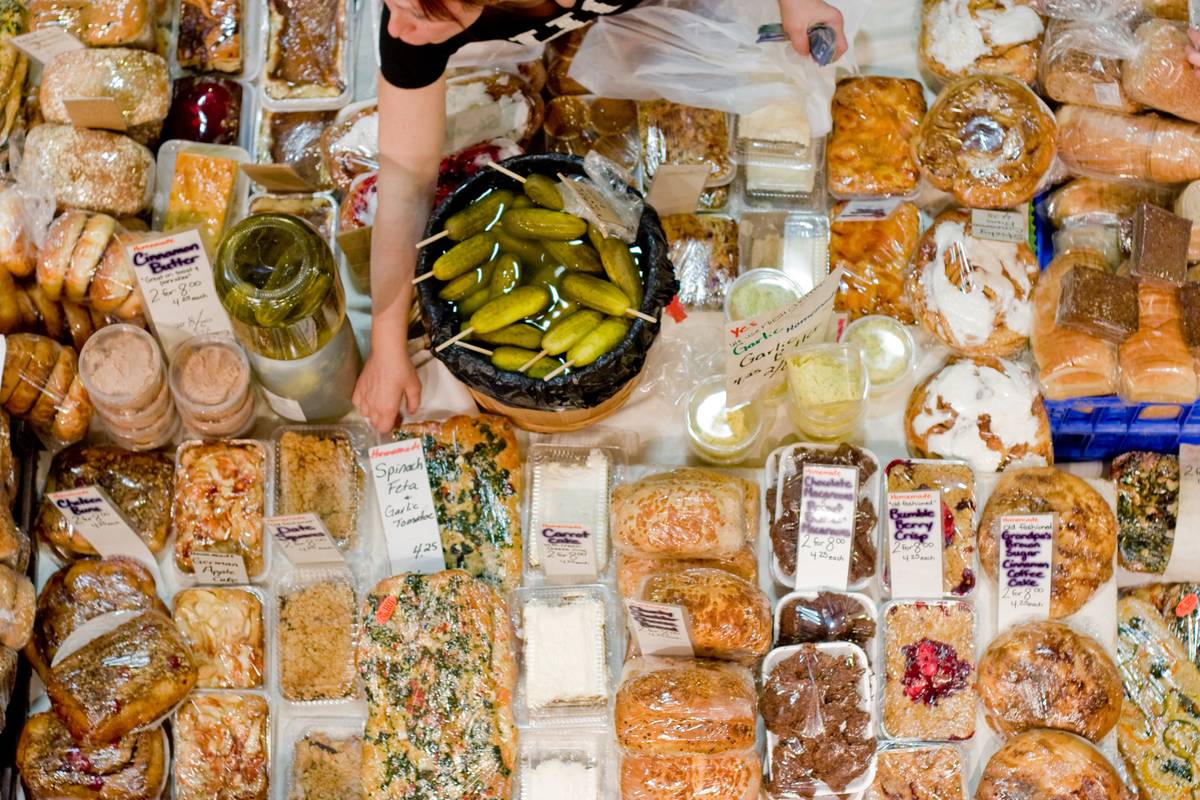Close-up of the variety of baking goods sold, including a pickle stick that is proven popular.