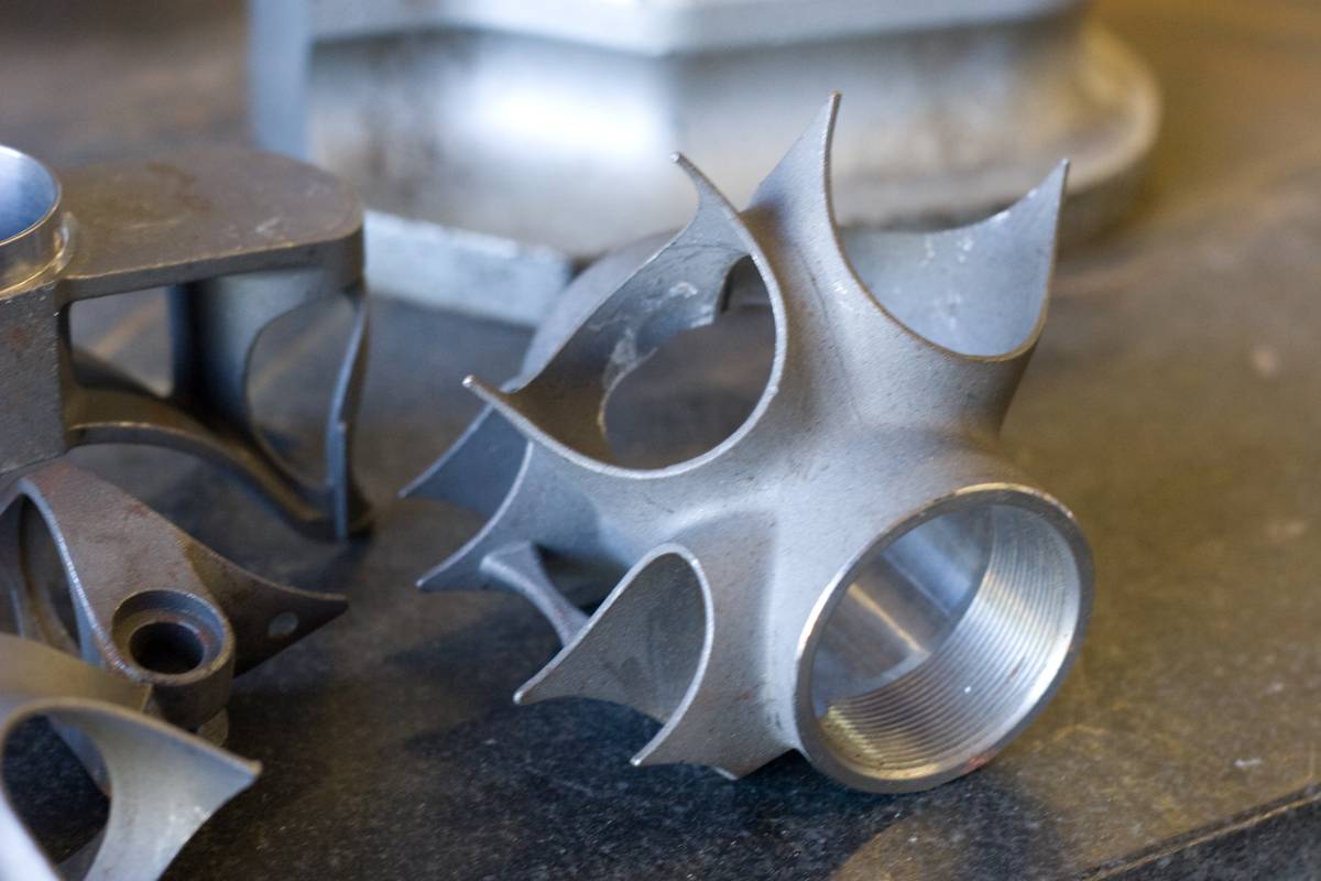 Unused seat lugs, bottom bracket shells and fork crowns can be found atop machining equipment