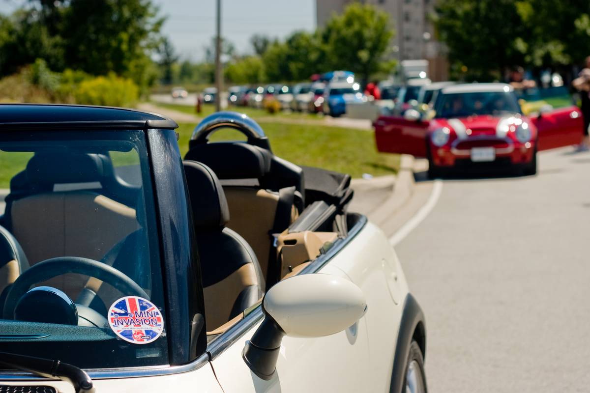 MINIs gathering at the Oakville dealership. All MINIs participating in the event must have the decal on.