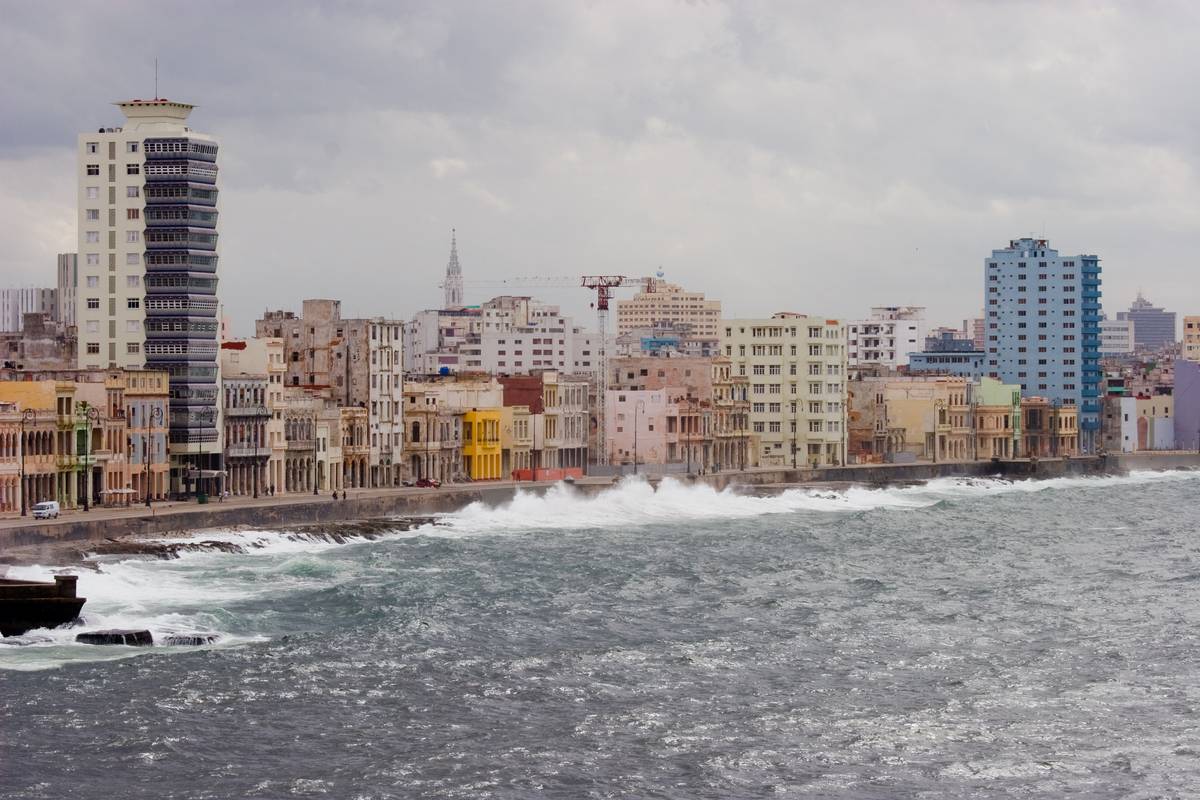 Buildings on [Malec&oacute;n](http://en.wikipedia.org/wiki/Malec%C3%B3n,_Havana), a seawall and road stretching 8km long. The esplanade was closed due to incliment weather.